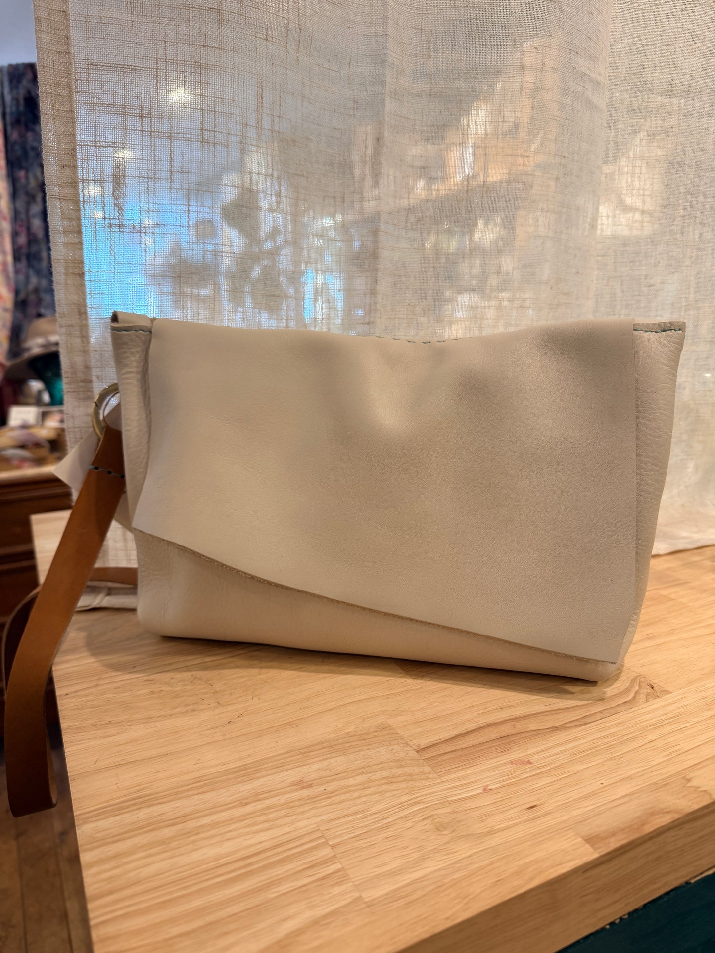 Bone white leather bag with a flap